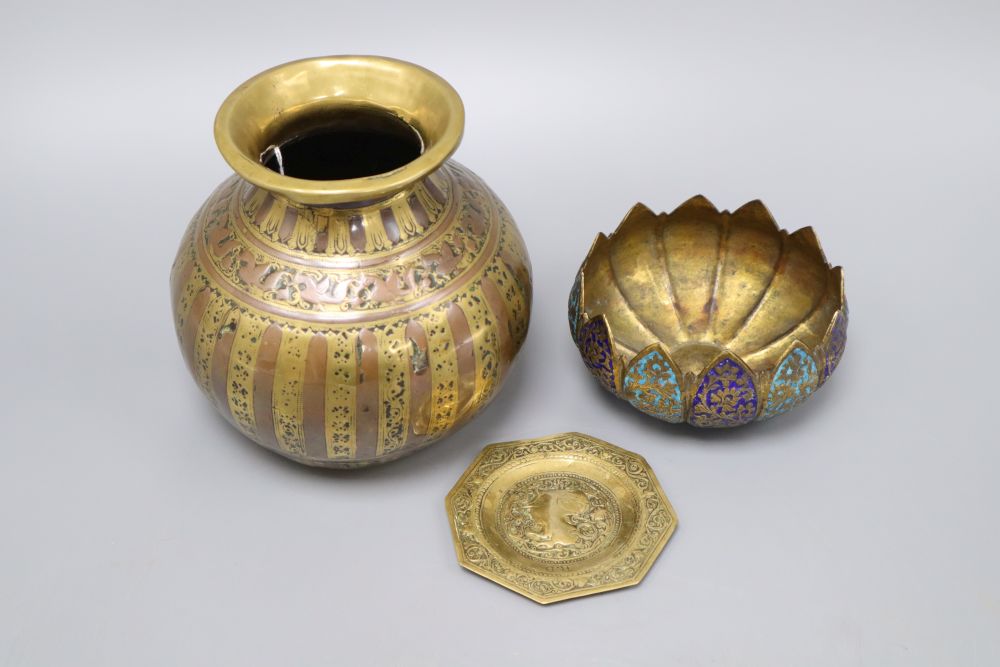 An Indian Lota water vase, height 15cm, a Persian lotus shaped enamelled bowl and a dish embossed with a lion, signed R.B.